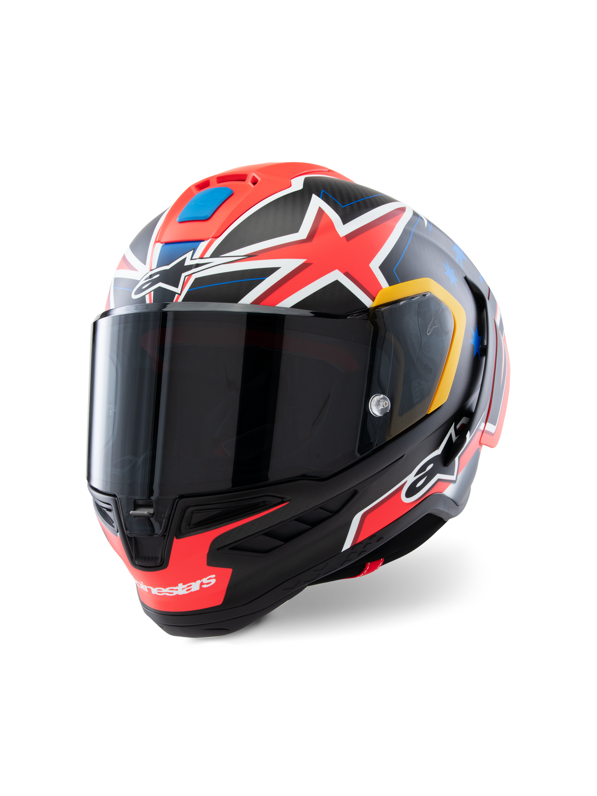 Kask Alpinestars Supertech R10 Miller Limited Edition, pełnotwarzowy kask wyścigowy, Carbon Red Matt z czerwonymi gwiazdami, niebieskie i żółte akcenty graficzne, przyciemniany wizjer, aerodynamiczna skorupa z włókna węglowego do profesjonalnych wyścigów motocyklowych