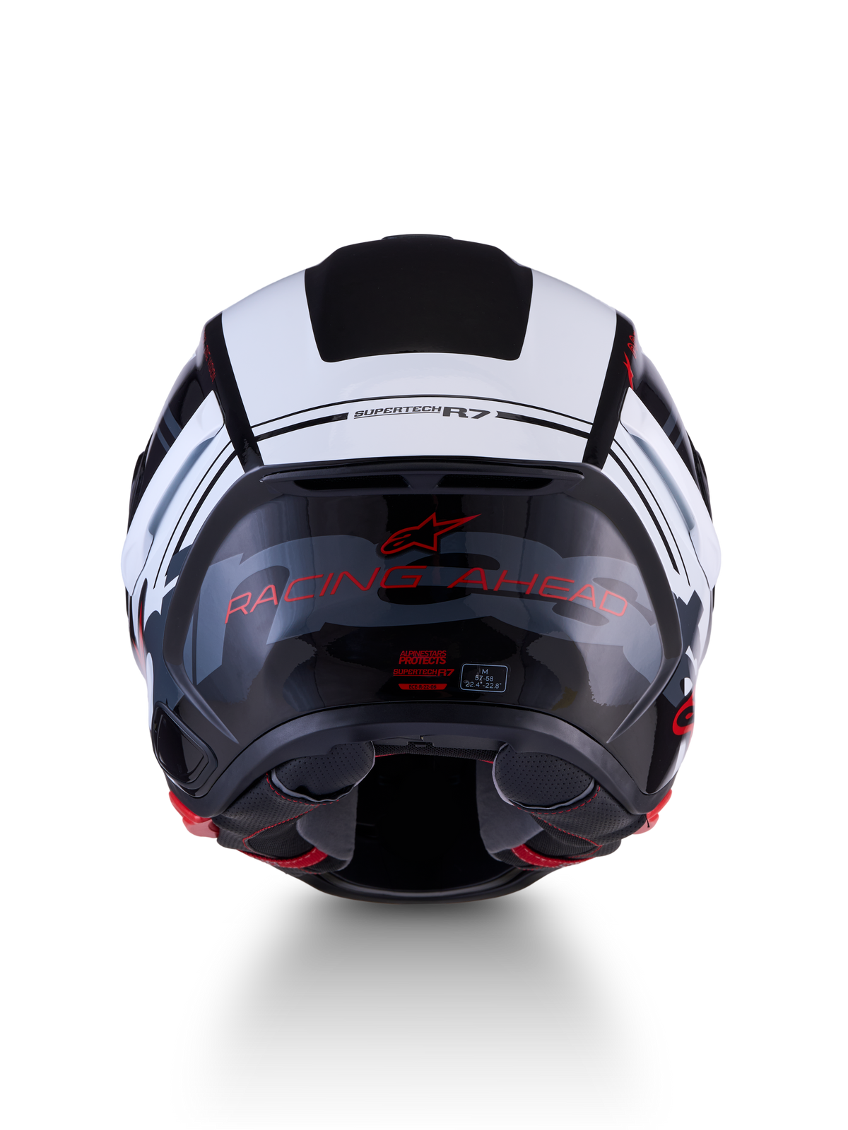 Alpinestars S-R7 A-Core Kask ECE 22.06, kask motocyklowy sportowy, widok z tyłu, czarno-biało-czerwone błyszczące wykończenie z napisem RACING AHEAD i etykietą certyfikacji ECE