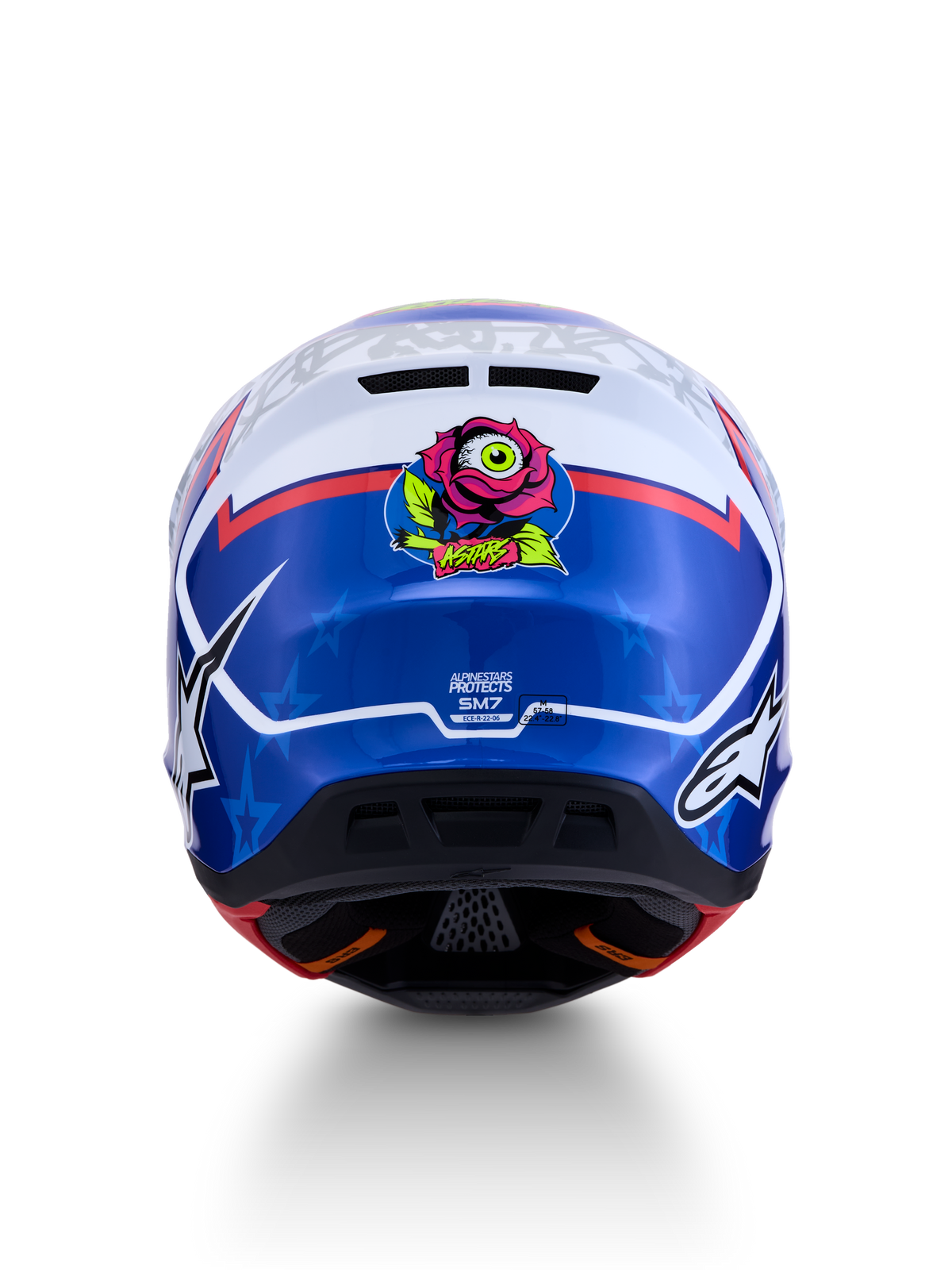 Alpinestars S-M7 Blaster ECE06, kask motocrossowy niebiesko-biały, tył z grafiką róży i certyfikatem ECE.