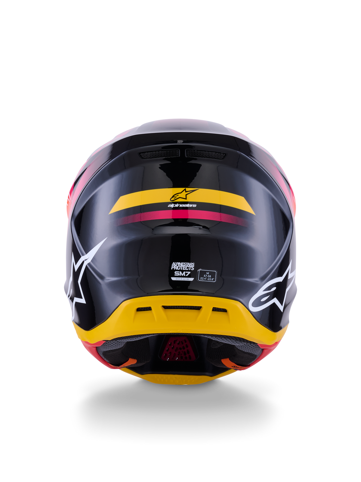 Alpinestars S-M7 Rise Helmet ECE 22.06, kask motocrossowy, widok z tyłu, błyszczący czarny z żółtymi i różowymi akcentami, duże białe logo po bokach, aerodynamiczna skorupa kompozytowa, wyścigowy sprzęt off-road