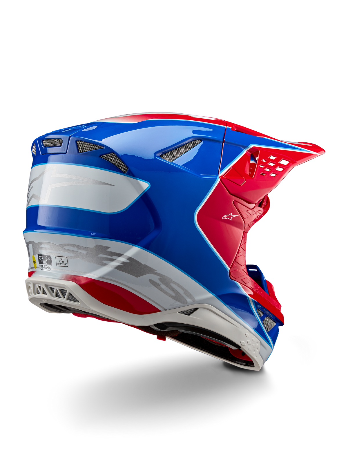 Alpinestars Supertech M10 Aeon ECE 22.06 Helmet, Motocross Helmet, Bright Red Blue and White Glossy, rear-side view featuring an aerodynamic profile, silver Alpinestars branding, and integrated ventilation ports.