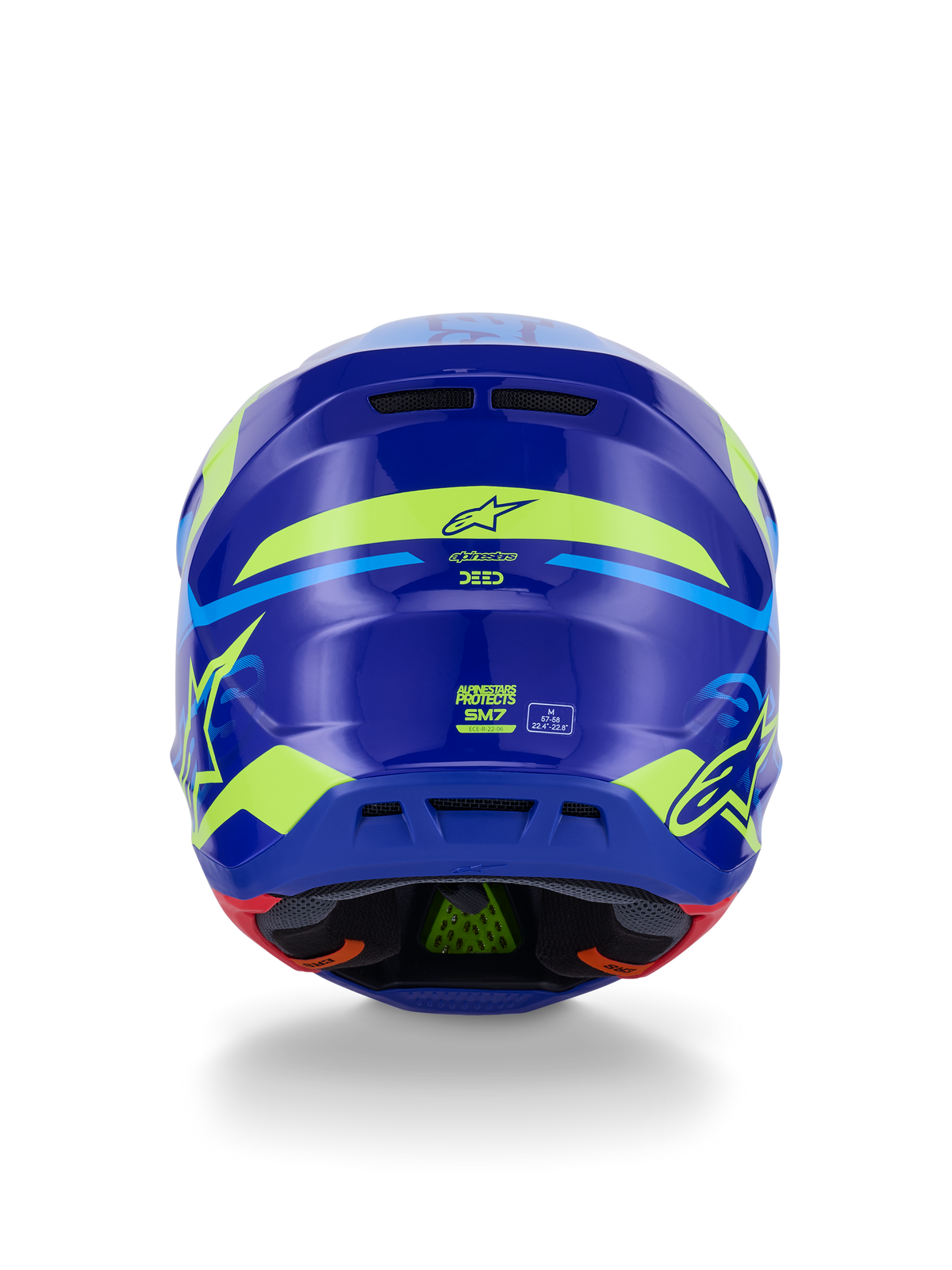 Alpinestars S-M7 Deed Helmet ECE 22.06, kask motocrossowy, widok z tyłu, niebiesko-żółty fluo połysk, z wyrazistymi fluorescencyjnymi żółtymi grafikami i logo gwiazdy, tylne otwory wylotowe, widoczna wewnętrzna wyściółka z zieloną technologią PLASMA.