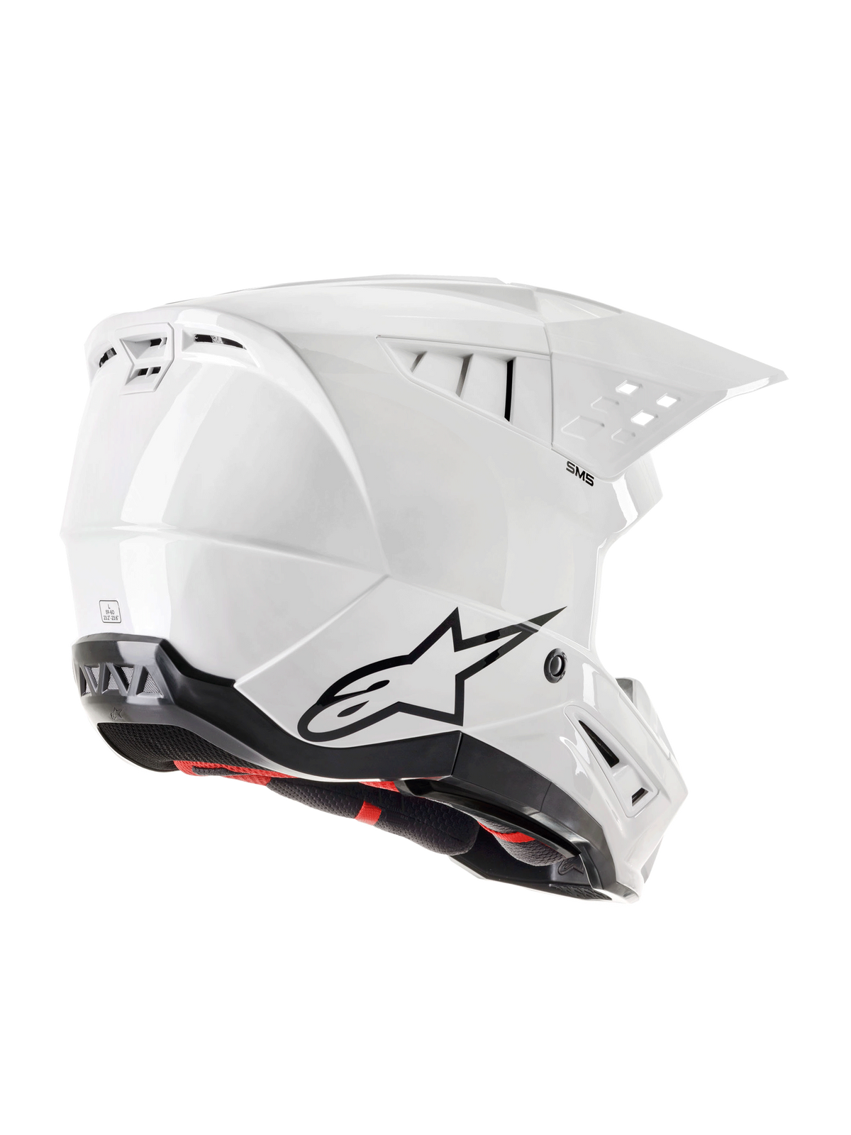 Kask Alpinestars S-M5 Solid ECE 22.06, kask motocrossowy, biały błyszczący, widok z tyłu z boku z czarnym logo Astars, zintegrowane otwory wentylacyjne i smukła aerodynamiczna konstrukcja skorupy