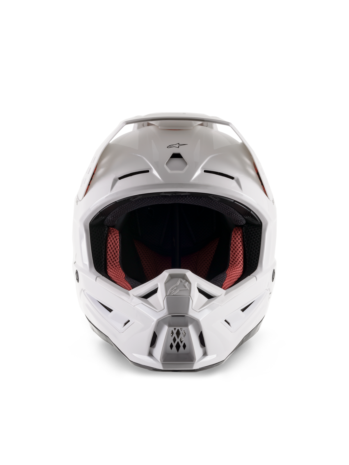 Alpinestars S-M5 Solid Helmet ECE 22.06, kask motocrossowy, biały połysk, widok z przodu, z wieloma wlotami powietrza na szczęce i czole, szeroki daszek, czerwono-czarna wyściółka wewnętrzna, smukły i aerodynamiczny design do jazdy terenowej