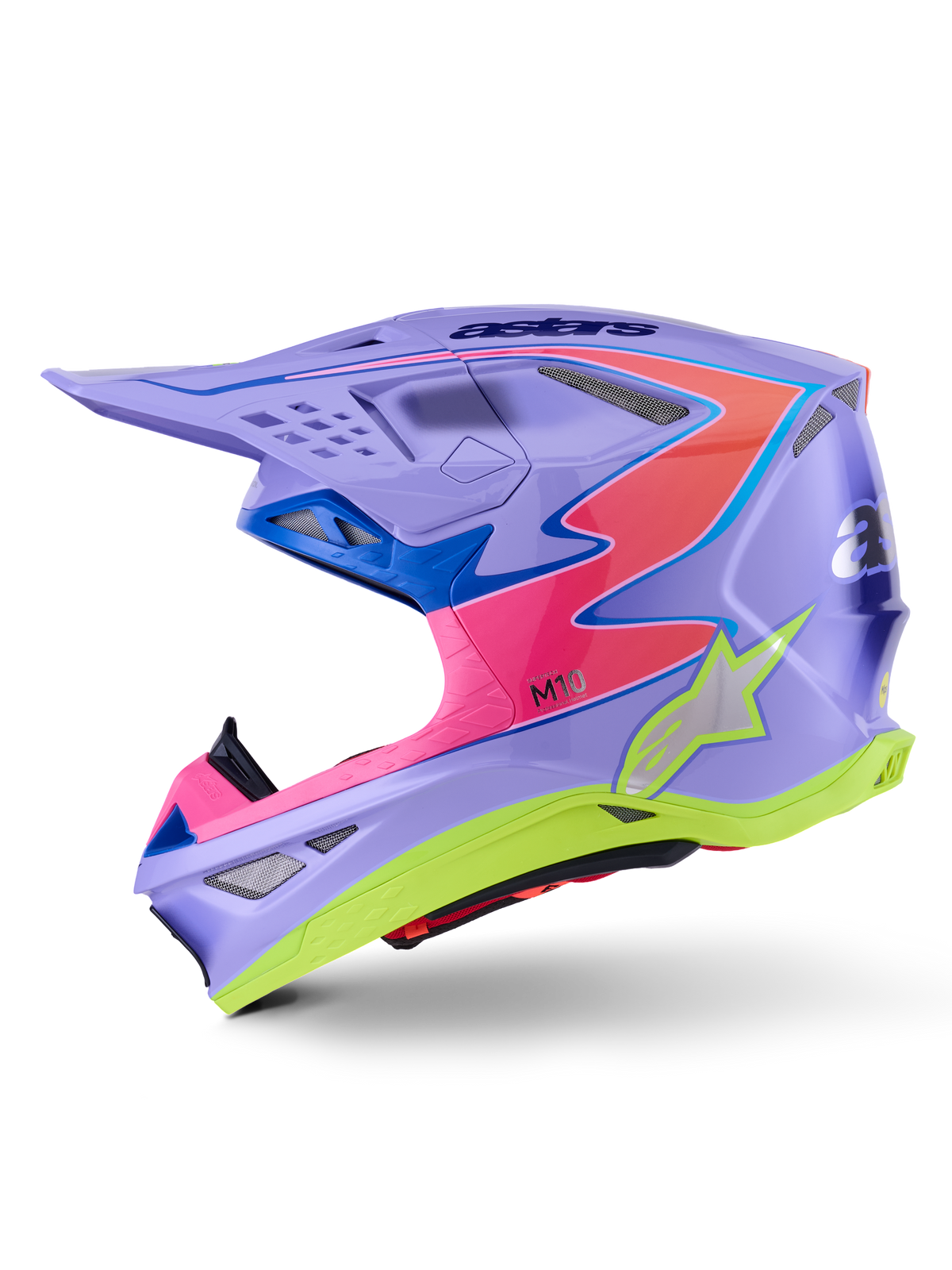 Kask Alpinestars Supertech M10 Jett Lawrence R01, kask motocrossowy, fioletowy z różowymi i neonowymi żółtymi akcentami, widok z boku przedstawiający aerodynamiczną skorupę z włókna węglowego, srebrne logo gwiazdy, liczne otwory wentylacyjne i wyrazisty design graficzny do profesjonalnych wyścigów motocrossowych.