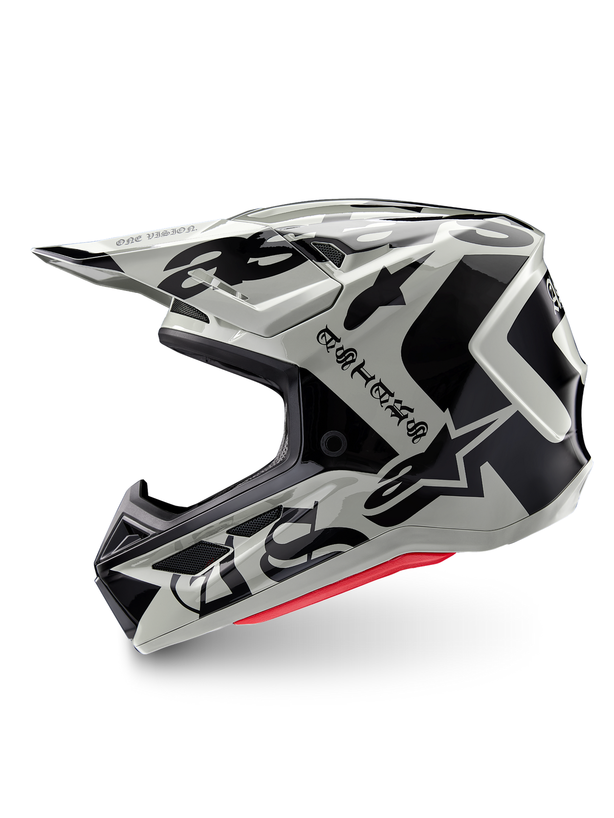 Kask Alpinestars Limited Edition S-M7 Wolf Dust, kask motocrossowy, Dune Black Glossy, skorupa w odcieniu złamanej bieli z czarnym gotyckim brandingiem ASTARS i wzorami graficznymi, widoczna czerwona wyściółka wewnętrzna, aerodynamiczny profil do wyścigów off-road