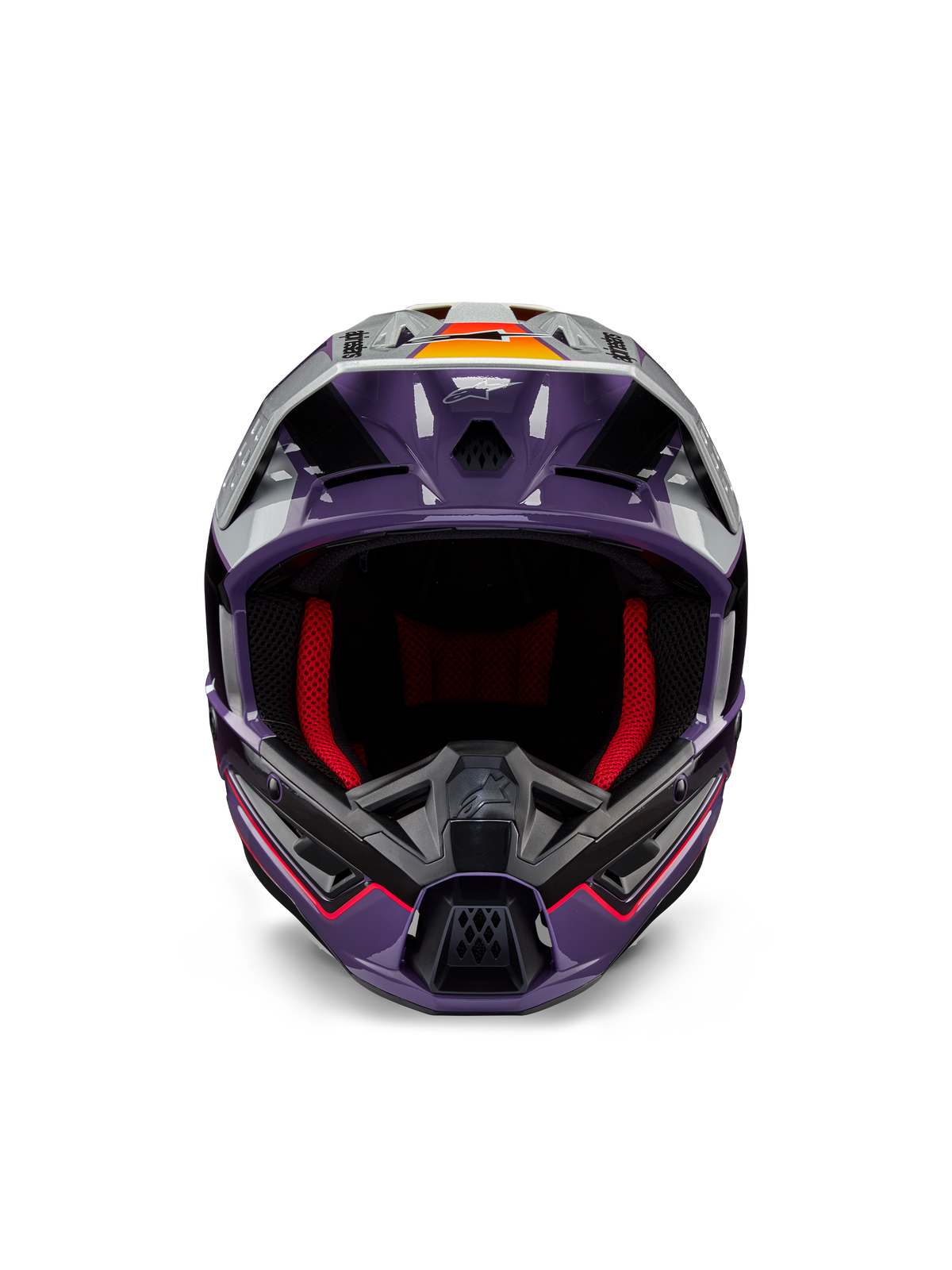 Alpinestars S-M5 Sail Helmet ECE, kask motocrossowy, fioletowo-czarny i srebrny z połyskiem, widok z przodu z czerwoną wyściółką, wentylowaną szczęką i daszkiem z pomarańczowymi akcentami, aerodynamiczna skorupa zapewniająca ochronę w terenie