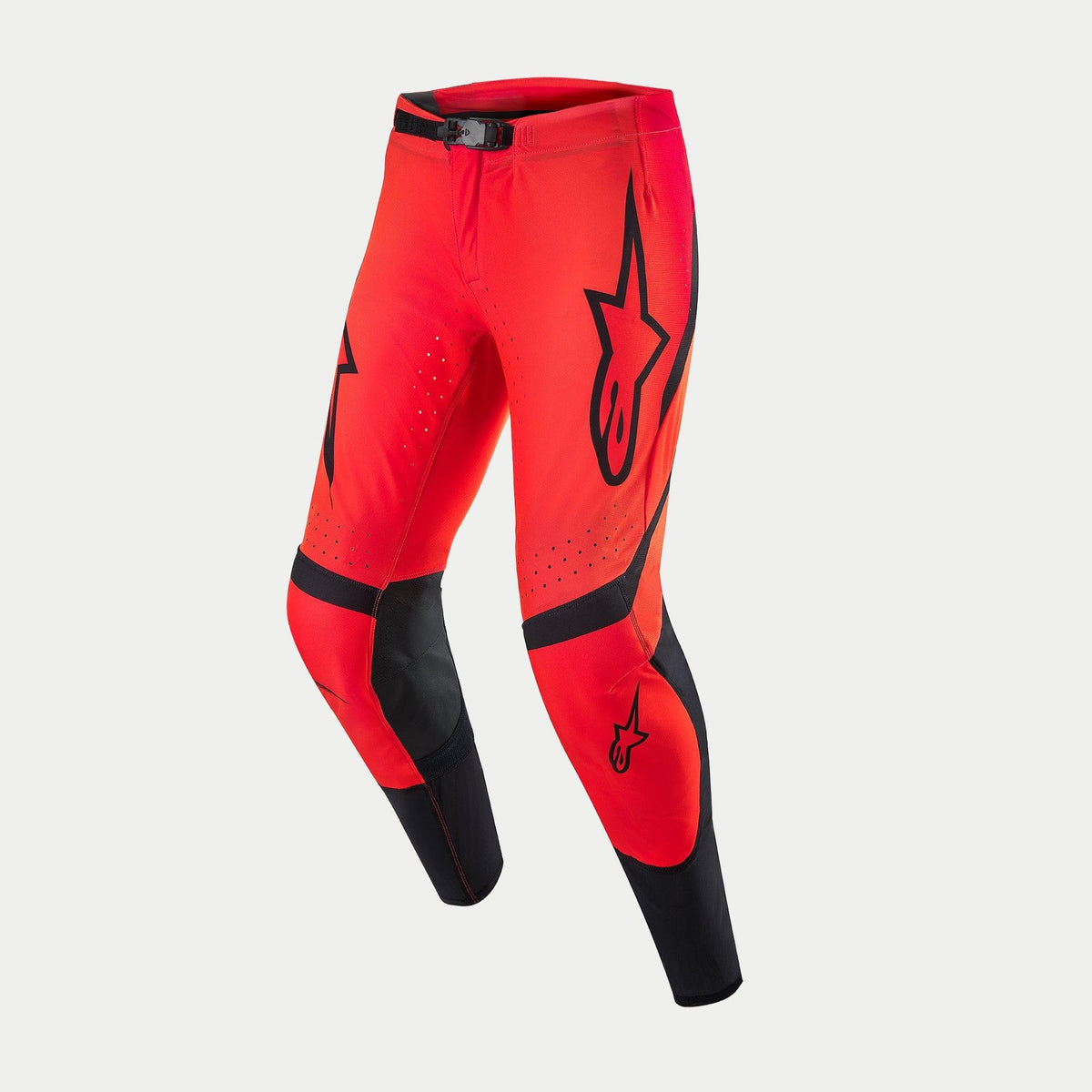 Alpinestars Supertech Ember LE Pants, Motocross Pants, Red Fluo and Bright Red with Black accents, bold Alpinestars logos on the thighs, perforated zones for ventilation, and black panels on inner legs and shins, high-performance gear for off-road racing.