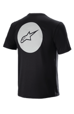 Alpinestars Dot Tech Tee, koszulka rowerowa z krótkim rękawem, czarna, widok z tyłu z dużym białym kołem i czarnym logo A-star, odprowadzająca wilgoć tkanina DriRelease do kolarstwa górskiego