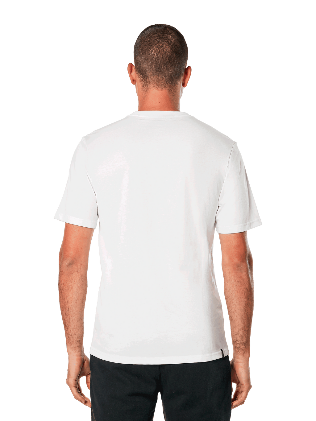 Alpinestars MX Helmet CSF Tee, koszulka z krótkim rękawem, biała, widok z tyłu, noszona z czarnymi spodniami, casualowy design inspirowany sportami motorowymi