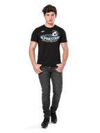 Alpinestars Semicircle CSF Tee, Short Sleeve T-Shirt, Black, White and light blue curved graphic on chest, worn by model with dark grey jeans and black sneakers, casual motorsport streetwear