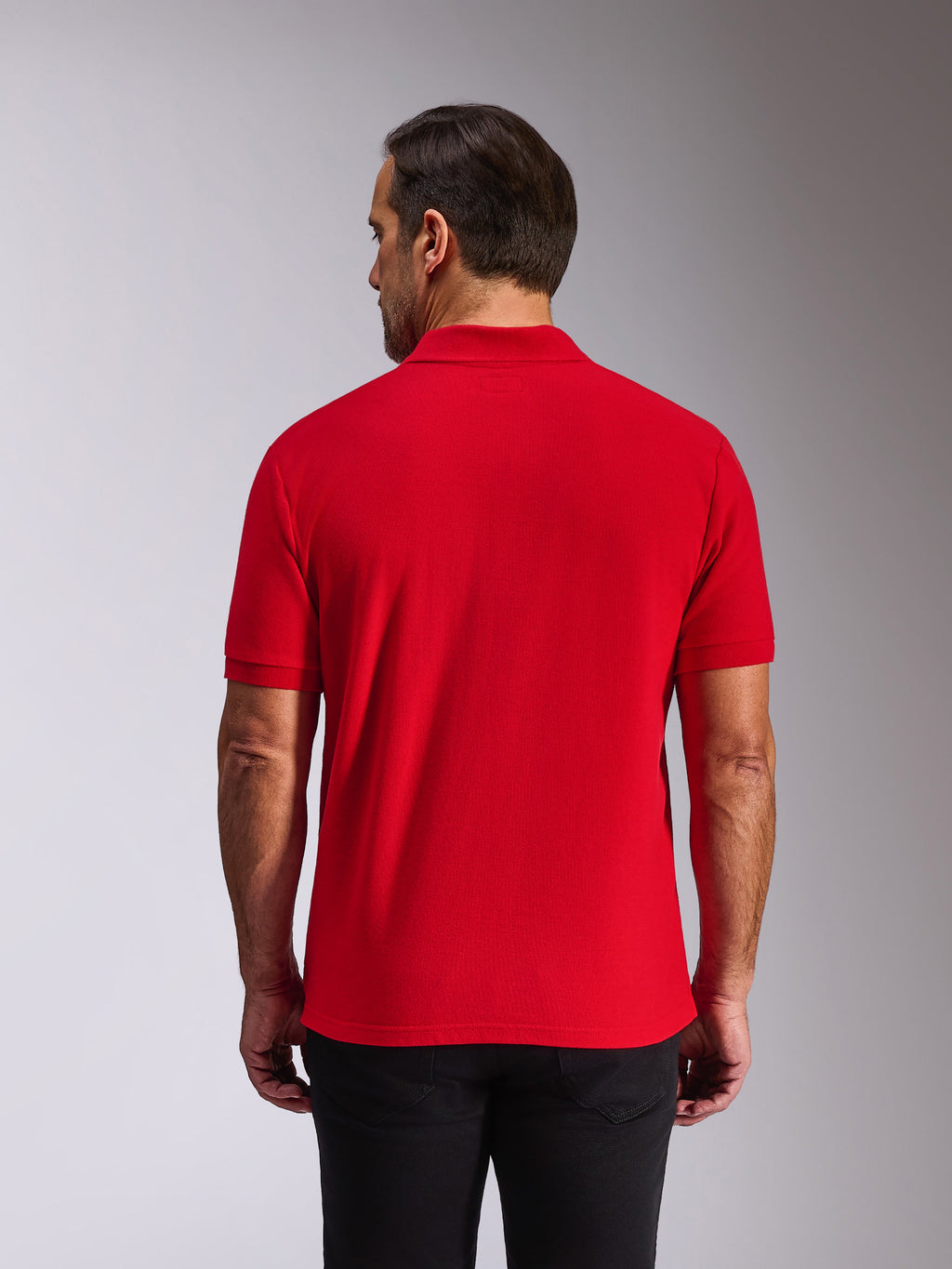 Alpinestars Endeavor Classic Polo, Short Sleeve Polo Shirt, Red, Back view on model, featuring ribbed collar and sleeve cuffs, casual motorsport-inspired streetwear