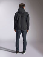 Alpinestars Emergent Oversized Hoodie, czarna bluza z kapturem, widok z tyłu z tonalnym haftem 3D logotypu Alpinestars, luźny krój oversize, polarowy materiał, styl streetwear
