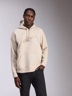 Alpinestars Emergent Oversized Hoodie, casualowa bluza streetwear, polar w kolorze złamanej bieli z haftowanym logo 3D ton w ton, kieszeń kangurka, kaptur ze sznurkiem, nowoczesny krój oversize