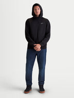 Alpinestars Cypher Hoodie, męska bluza z kapturem rozpinana, czarna, odzież sportowa, polar tri-blend, wysoki kaptur z podszewką z siateczki i małe białe logo Astars na piersi, prezentowana na modelu w codziennej stylizacji.