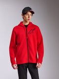 Alpinestars Transverse Hoodie, czerwona rozpinana bluza z kapturem z polaru, czarne logo Astars na piersi i nadruk 'One Goal', casualowy styl streetwearowy noszony z czarną czapką i spodniami