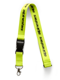 Alpinestars Linear Lanyard, Hi Vis Yellow with black printed logo, features a black breakaway plastic buckle and metal swivel clip, 20-inch polyester neck strap, motorsport-inspired accessory