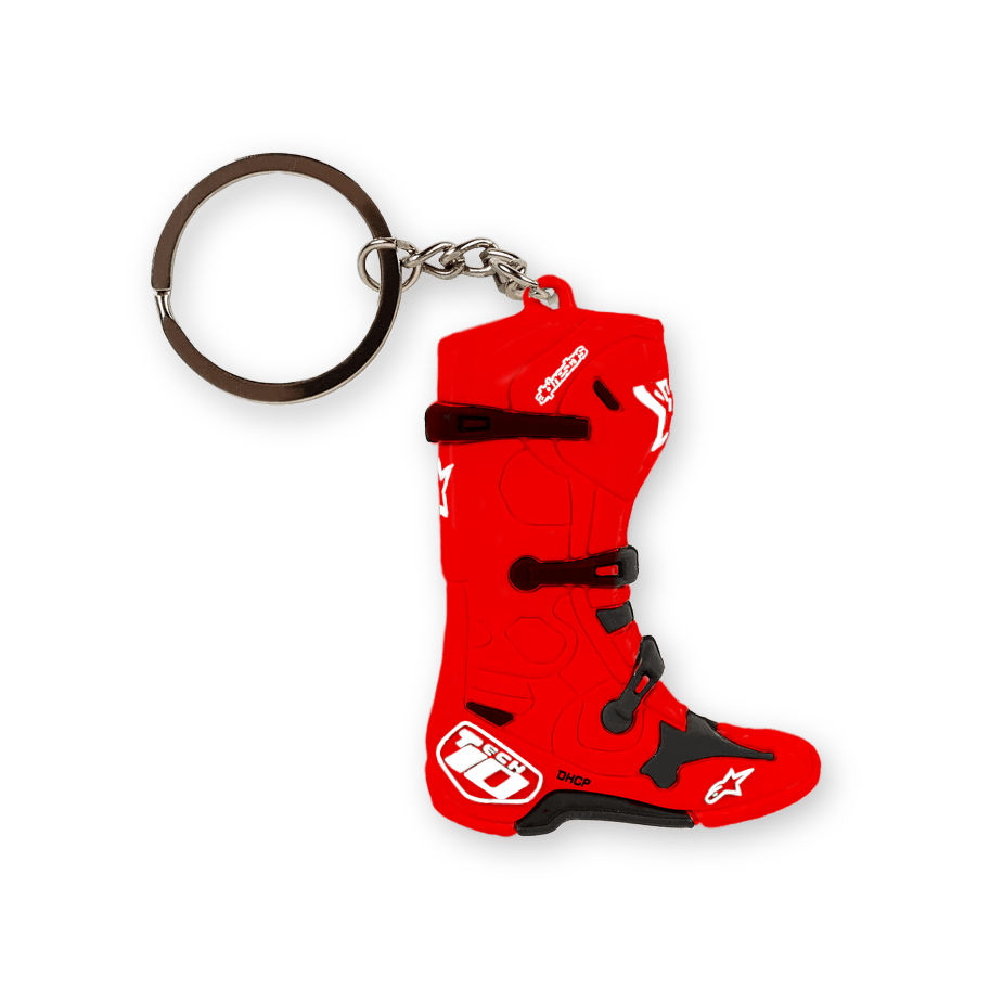 Alpinestars Tech 10 Boot Keyfob, trójwymiarowy brelok w kształcie miniaturowego buta motocrossowego, czerwony z czarnymi i białymi akcentami, srebrny metalowy pierścień, szczegółowy design buta wyścigowego, akcesorium sportowe motorsport