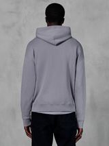 Alpinestars Essentials Ageless Hoodie, silver grey fleece, back view, featuring a minimalist pullover design with a hood and ribbed cuffs, casual motorsport-inspired streetwear