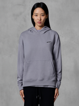 Alpinestars Essentials Ageless Hoodie, casual sportswear, silver with small black logo, kangaroo pocket, hooded pullover, worn by model, modern lifestyle apparel