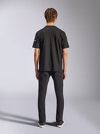 Alpinestars Frontal CSF Tee, Short Sleeve T-Shirt, Black, Rear view on model wearing black jeans, casual performance streetwear featuring small white sleeve logo detail