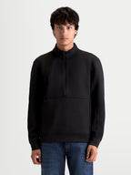 Alpinestars Apera Half-Zip, męska bluza sportowa typu pulower, czarna, zapięcie na zamek do połowy, kieszeń kangurka i tonalne nadruki logo HD, materiał polar tri-blend.