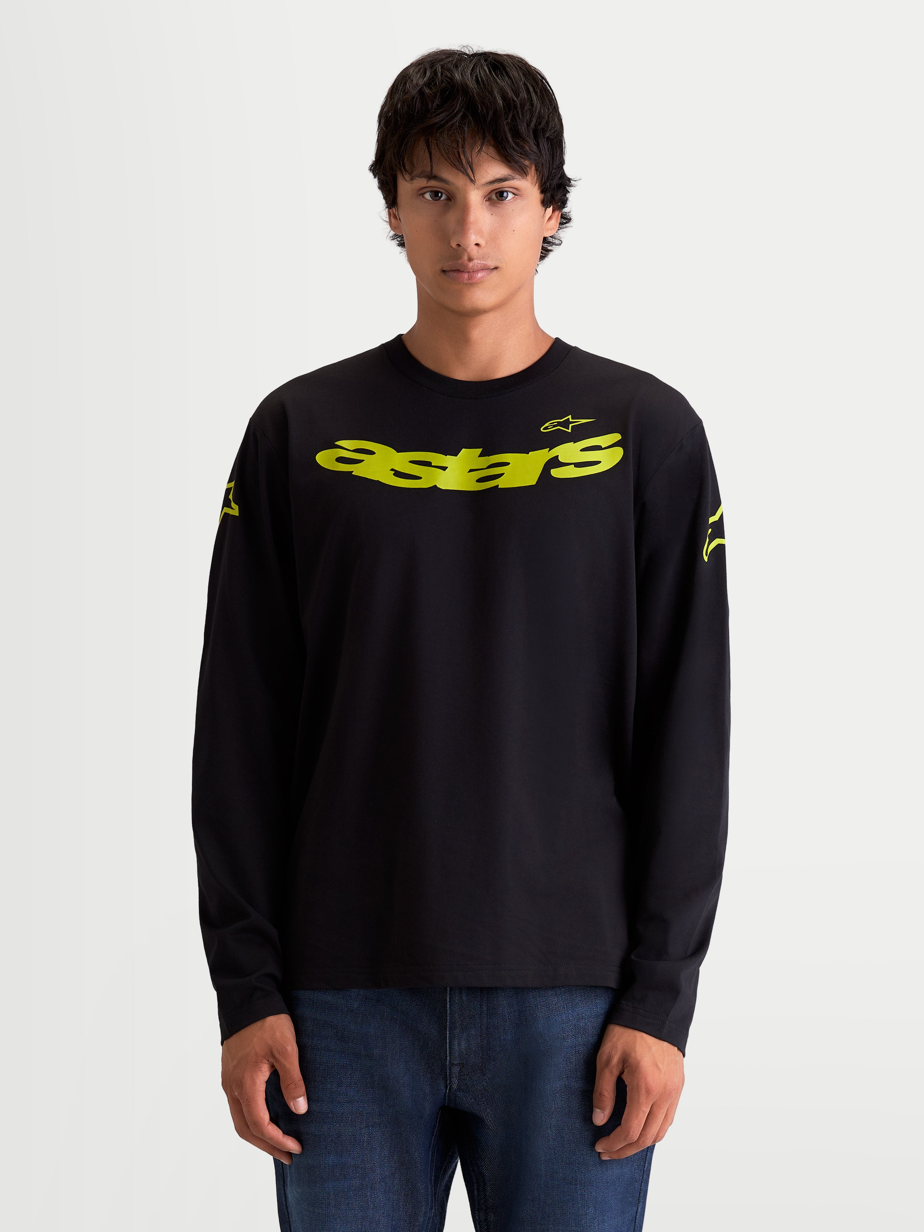 Alpinestars Velocifier CSF, czarna męska koszulka z długim rękawem, żółta zakrzywiona grafika Astars na piersi i logo na ramionach, sportswear inspirowany motorsportem