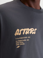 Alpinestars Chalk Oversized CSF Tee, Unisex Sportswear Short Sleeve T-Shirt, Charcoal Gray with Cream Graphic, Close-up detail of front chest logo featuring Astars branding and One Goal One Vision manifesto, premium cotton-poly blend.
