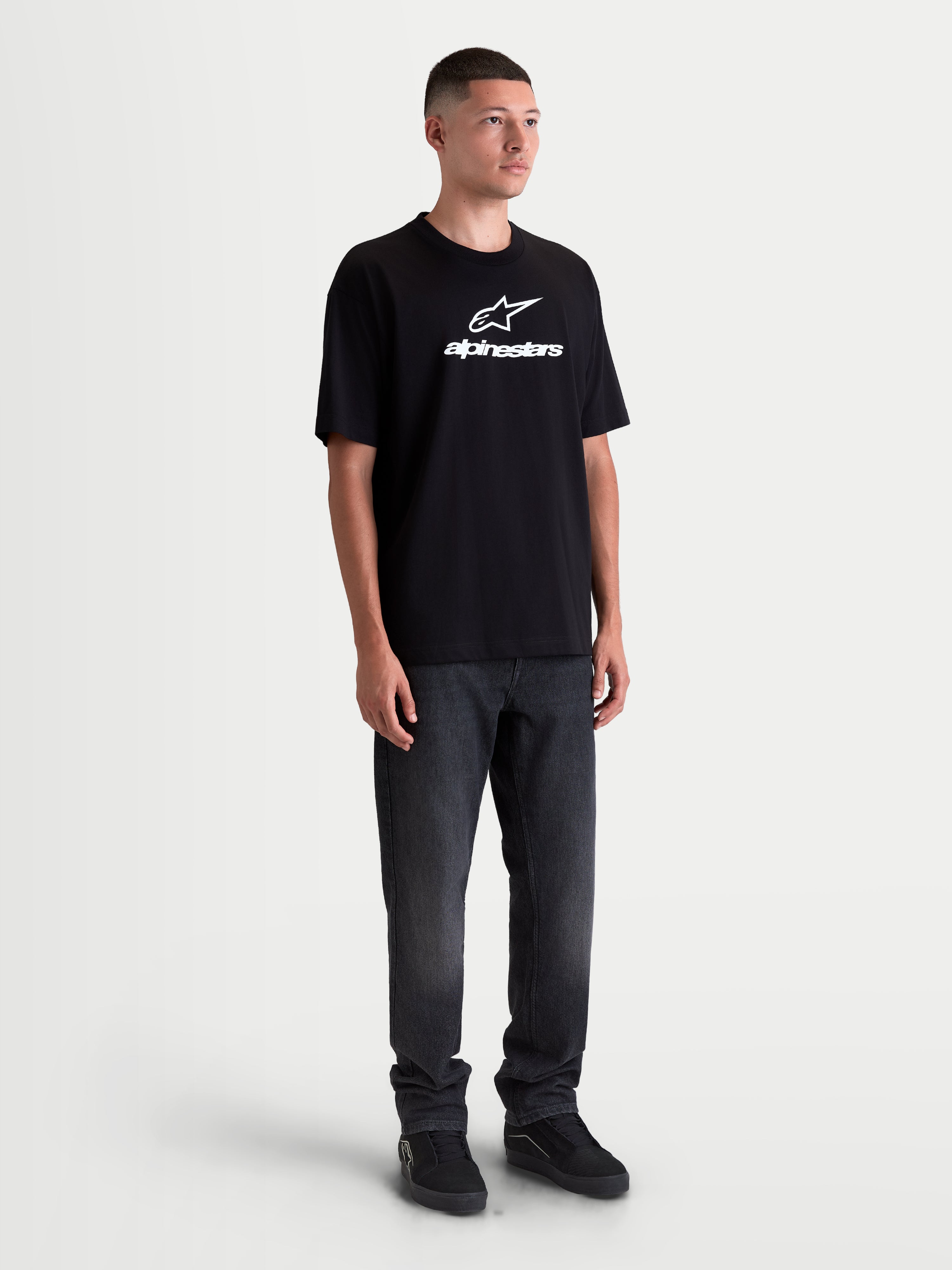 Alpinestars Prelude Oversized CSF Tee, Unisex Short Sleeve Sportswear T-Shirt in Black featuring a white front logo, relaxed oversized fit for casual comfort, cotton-poly blend.