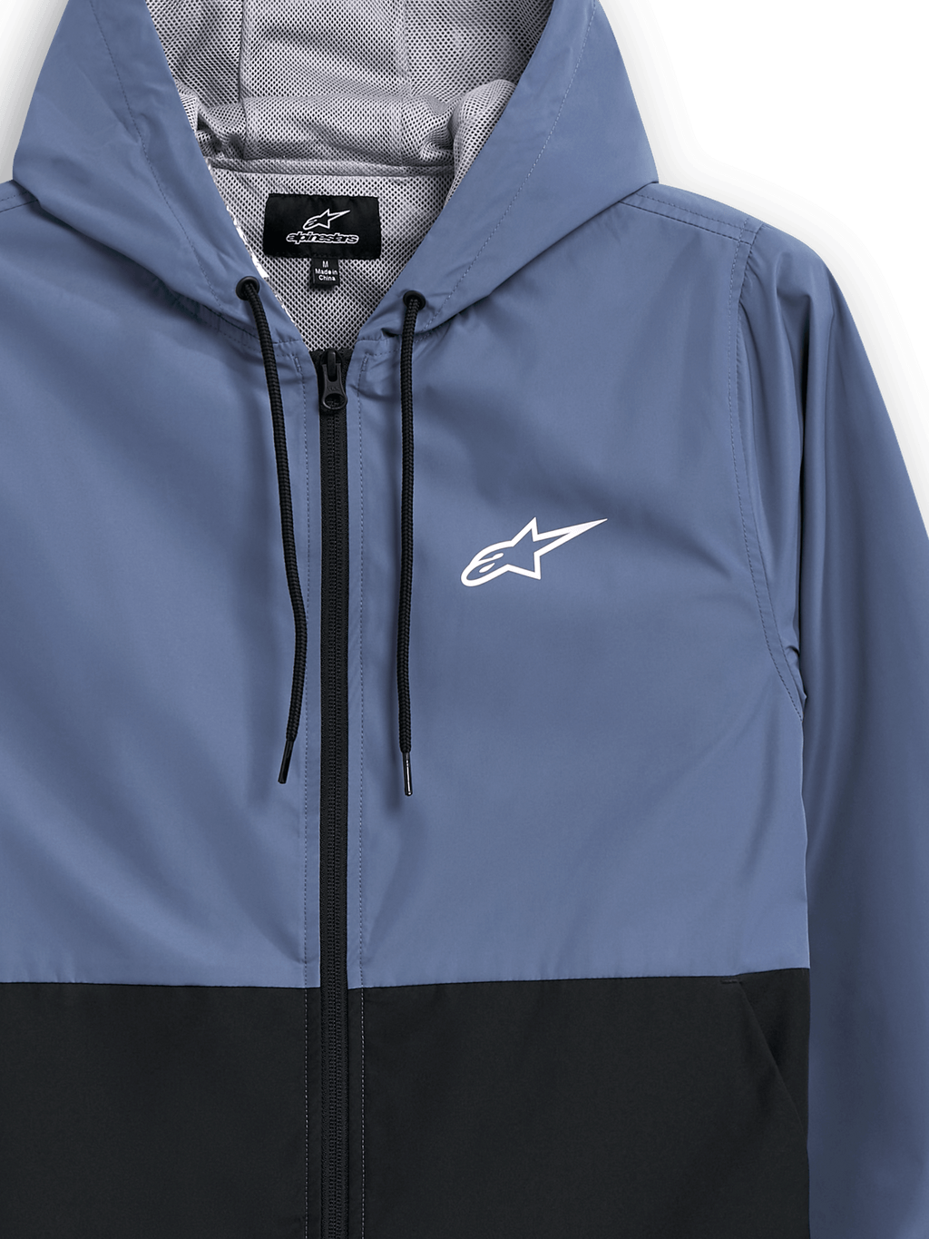 Kurtka wiatrówka Alpinestars Speeder, stalowoniebieska i czarna, lekka wiatrówka z kapturem, siateczkowa podszewka, czarne sznurki, białe logo gwiazdy Alpinestars na piersi, dwukolorowa konstrukcja, codzienna odzież uliczna inspirowana motorsportem
