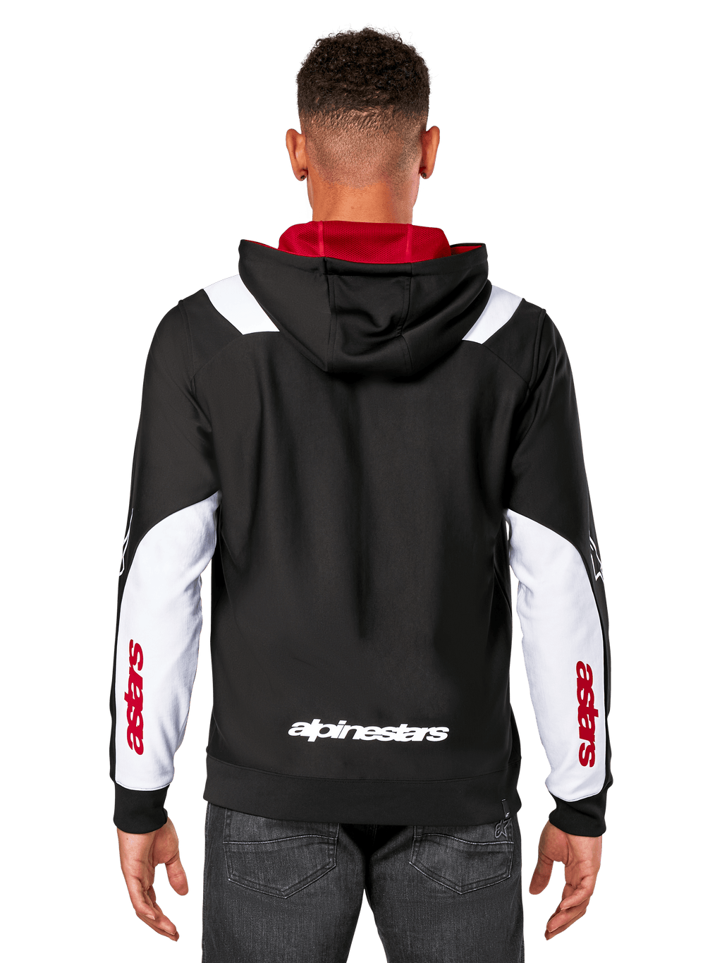 Alpinestars Sessions V3 Hoodie, widok z tyłu, czarna z białymi panelami na rękawach i czerwoną podszewką kaptura, z białym napisem z tyłu i czerwonym brandingiem na rękawach, codzienna odzież streetwearowa inspirowana sportami motorowymi