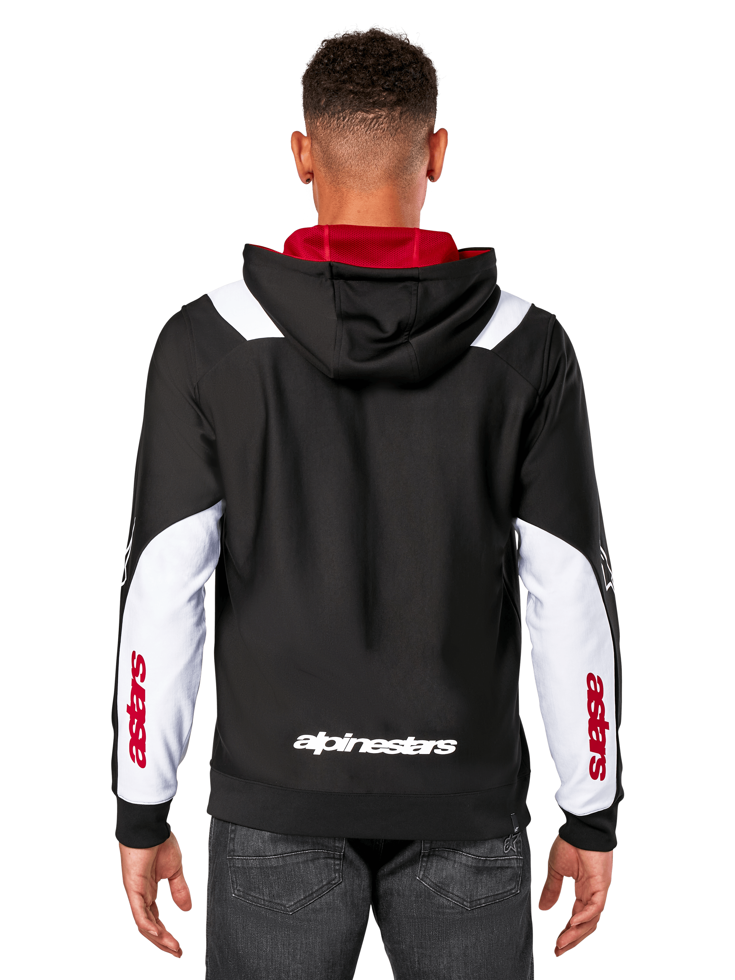 Alpinestars Sessions V3 Hoodie, widok z tyłu, czarna z białymi panelami na rękawach i czerwoną podszewką kaptura, z białym napisem z tyłu i czerwonym brandingiem na rękawach, codzienna odzież streetwearowa inspirowana sportami motorowymi