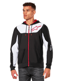 Alpinestars Sessions V3 Hoodie, bluza z kapturem na zamek, czarna z białymi panelami i czerwonymi akcentami, czerwony zamek błyskawiczny, kaptur podszyty siatką, logo gwiazdy Alpinestars na klatce piersiowej, codzienna odzież typu streetwear inspirowana sportami motorowymi