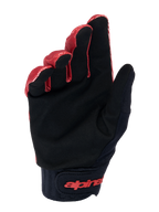 Rękawice Alpinestars A-Dura, rękawice do roweru górskiego, ciemnopomarańczowe i czarne, widok dłoni z czarnym syntetycznym zamszem dla lepszej przyczepności, szeroki neoprenowy mankiet z czerwonym logo na zapięciu na rzep, zaprojektowane z myślą o trwałości i wyczuciu MTB