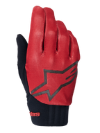 Alpinestars A-Dura Gloves, rękawice rowerowe MTB, ciemnopomarańczowe i czarne, górna część z teksturowanym wzorem kratki, duże czarne logo gwiazdy, czarny neoprenowy mankiet z czerwonym oznaczeniem marki, zaprojektowane dla przyczepności i wydajności podczas jazdy na rowerze górskim