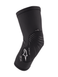 Alpinestars Youth Paragon Lite Knee Protector, czarny młodzieżowy ochraniacz na kolana MTB, oddychający rękaw z siatki z teksturowanym panelem przednim, białe logo Astar, lekka i elastyczna konstrukcja slip-on