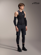 Alpinestars A-Motion Plasma Protection Vest, men's mountain bike protection vest in black camo, on-model studio view wearing protective gear and matching riding apparel, lightweight MTB armor with CE certified chest and back protection