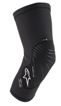 Alpinestars Paragon Lite Knee Protector, czarne, lekkie ochraniacze na kolana o konstrukcji z teksturowanej siateczki, białe logo, szare linie designu, wsuwana konstrukcja, z metkami CE Level 1 i Polygiene, przeznaczone do MTB i jazdy terenowej