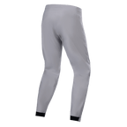 Alpinestars A-Dura Waterproof Pants, spodnie MTB, tytanowy szary, widok z tyłu, zwężane nogawki z czarnymi elastycznymi mankietami, minimalistyczny techniczny design do kolarstwa górskiego