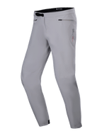 Alpinestars A-Dura Waterproof Pants, spodnie MTB, kolor szary Titanium, z czarnym zapięciem na zapadkę w pasie, kieszeniami na biodrach na zamek i zwężanymi nogawkami, trwała wodoodporna konstrukcja do jazdy na rowerze górskim.