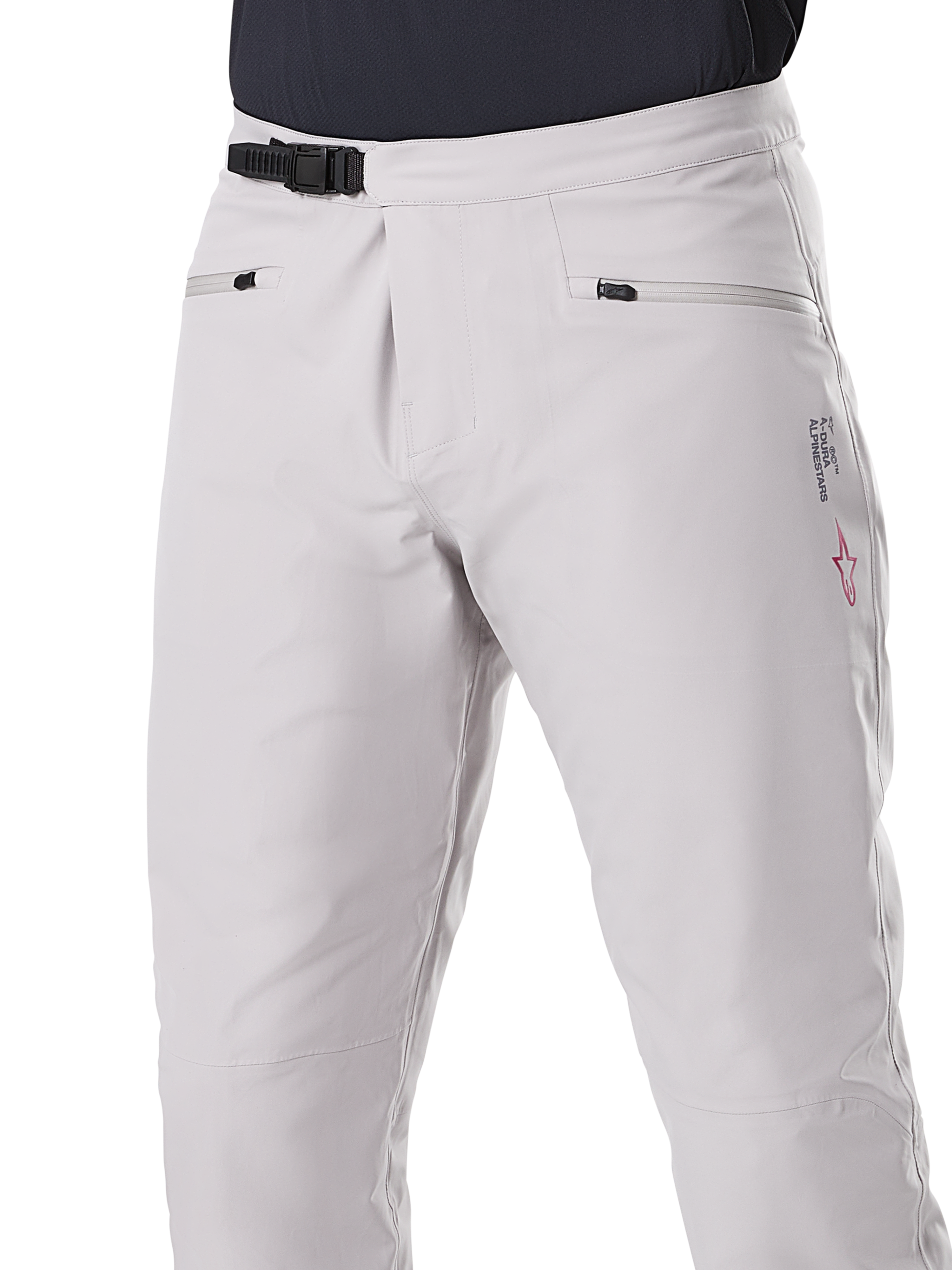 Alpinestars A-Dura Waterproof Pants, spodnie MTB, tytanowy szary, widok z przodu pokazujący czarne zapięcie zapadkowe w pasie i kieszenie na zamek, trwała wodoodporna konstrukcja do kolarstwa górskiego