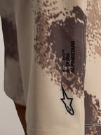 Szorty Alpinestars A-Dura Ride w kolorze sand camo, techniczny materiał 4-way stretch z logo Astar.