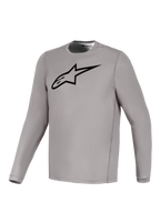 Szara koszulka Alpinestars A-Dura Ride z długim rękawem, czarne logo na piersi, oddychający, elastyczny materiał MTB.