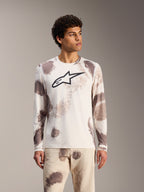 Koszulka Alpinestars A-Dura Ride Long Sleeve, kolor Sand Camo, biały top MTB w abstrakcyjne wzory z czarnym logo.