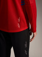 Czerwona koszulka A-Dura Elite 2.0 i czarne spodnie MTB z logo Alpinestars, techniczny materiał.