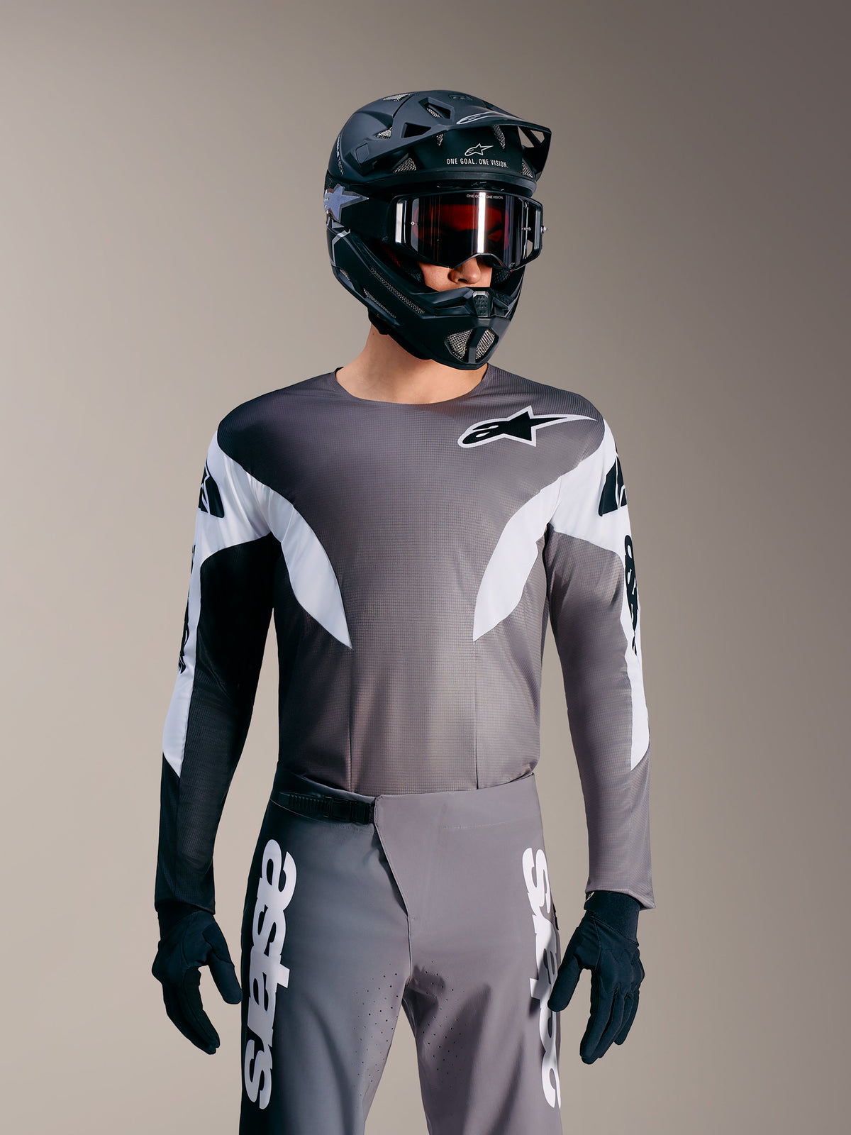 Koszulka MTB A-Supra Elite Faded Gray, mikroperforowany top z białymi akcentami i brandingiem Alpinestars.