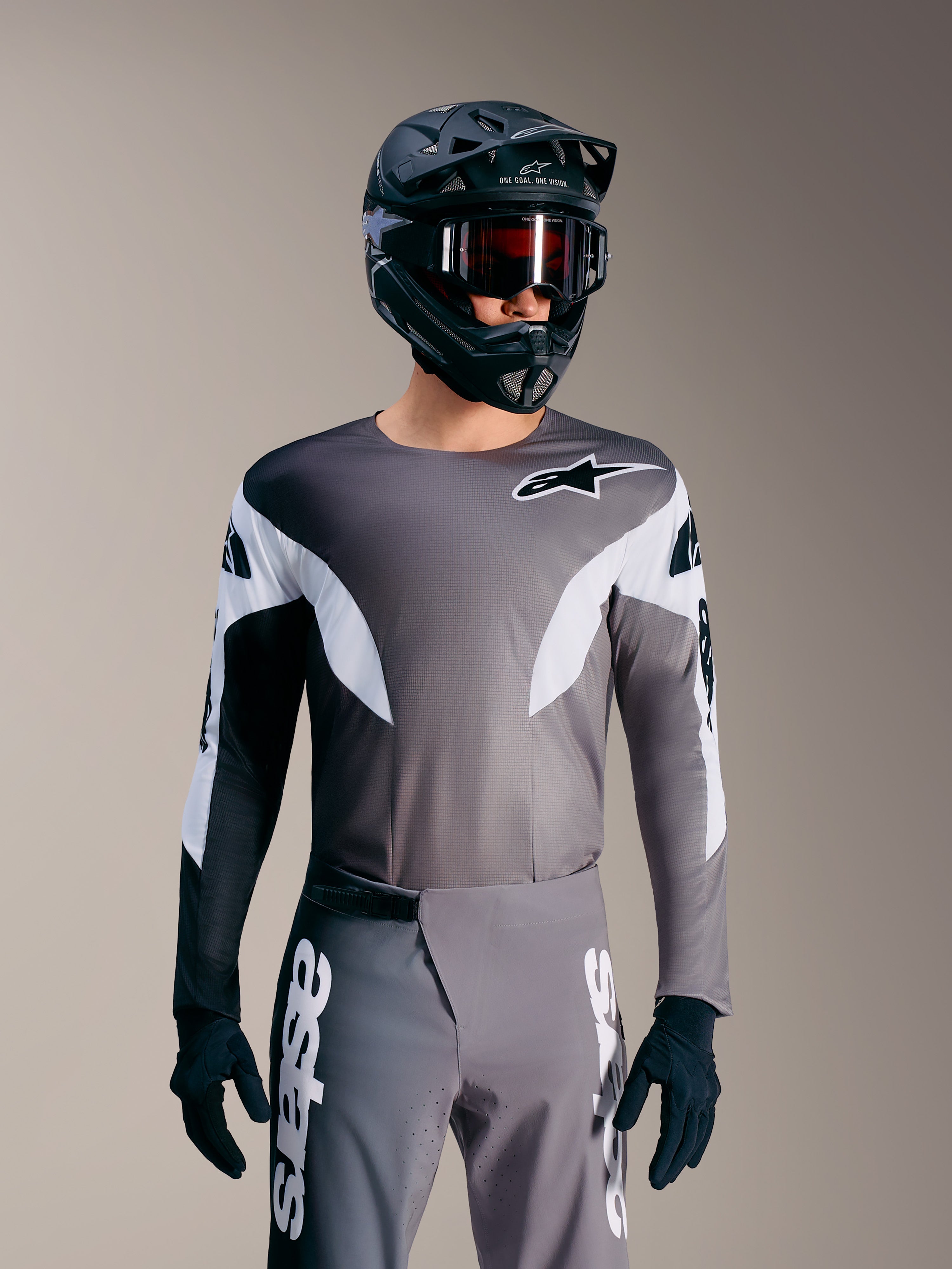 Koszulka MTB A-Supra Elite Faded Gray, mikroperforowany top z białymi akcentami i brandingiem Alpinestars.