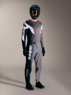 Zestaw MTB A-Supra Elite Faded Gray, techniczne spodnie z białym logotypem Astars i dopasowana bluza wyścigowa.