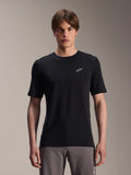 Alpinestars A-Dura Dri Wool Short Sleeve Jersey, Black, worn by male model, small white Alpinestars logo on chest, performance cycling apparel for MTB trail riding, moisture-wicking drirelease wool fabric