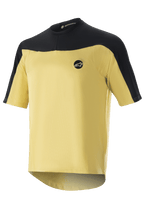 Alpinestars Drop Meta Jersey - Short Sleeve, koszulka rowerowa MTB, złota i czarna, siateczkowa konstrukcja z kontrastowymi panelami na ramionach, okrągłe logo na piersi i przedłużony tył